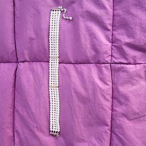Vintage Four Strand Faux Pearl Choker with reversible rhinestone/goldtone bars.